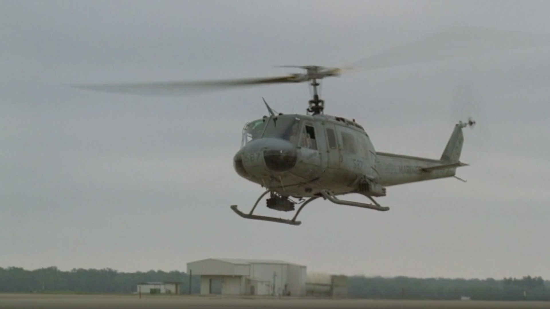 A Vietnam War-era helicopter in the sky.